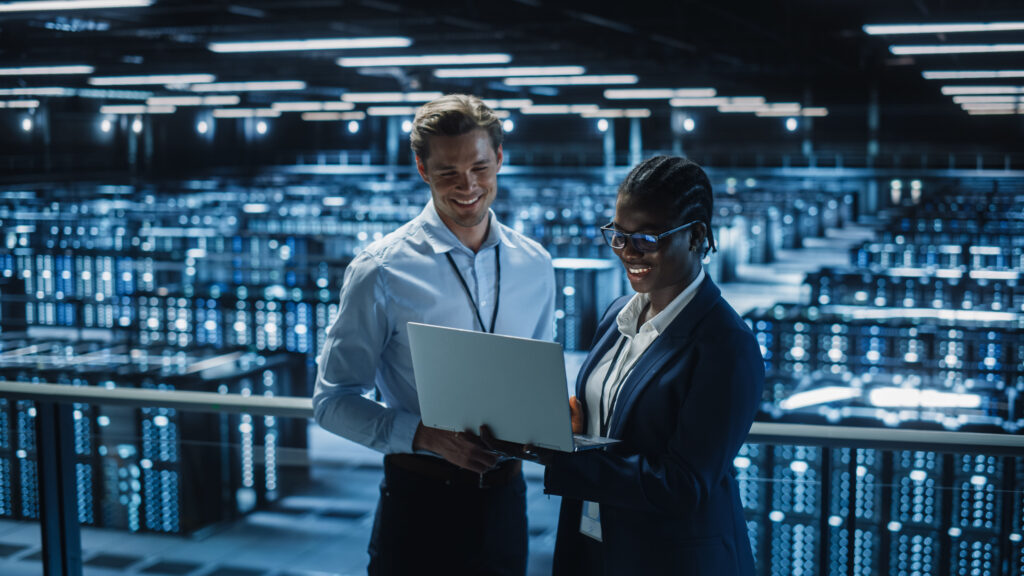 two people inside a data centre